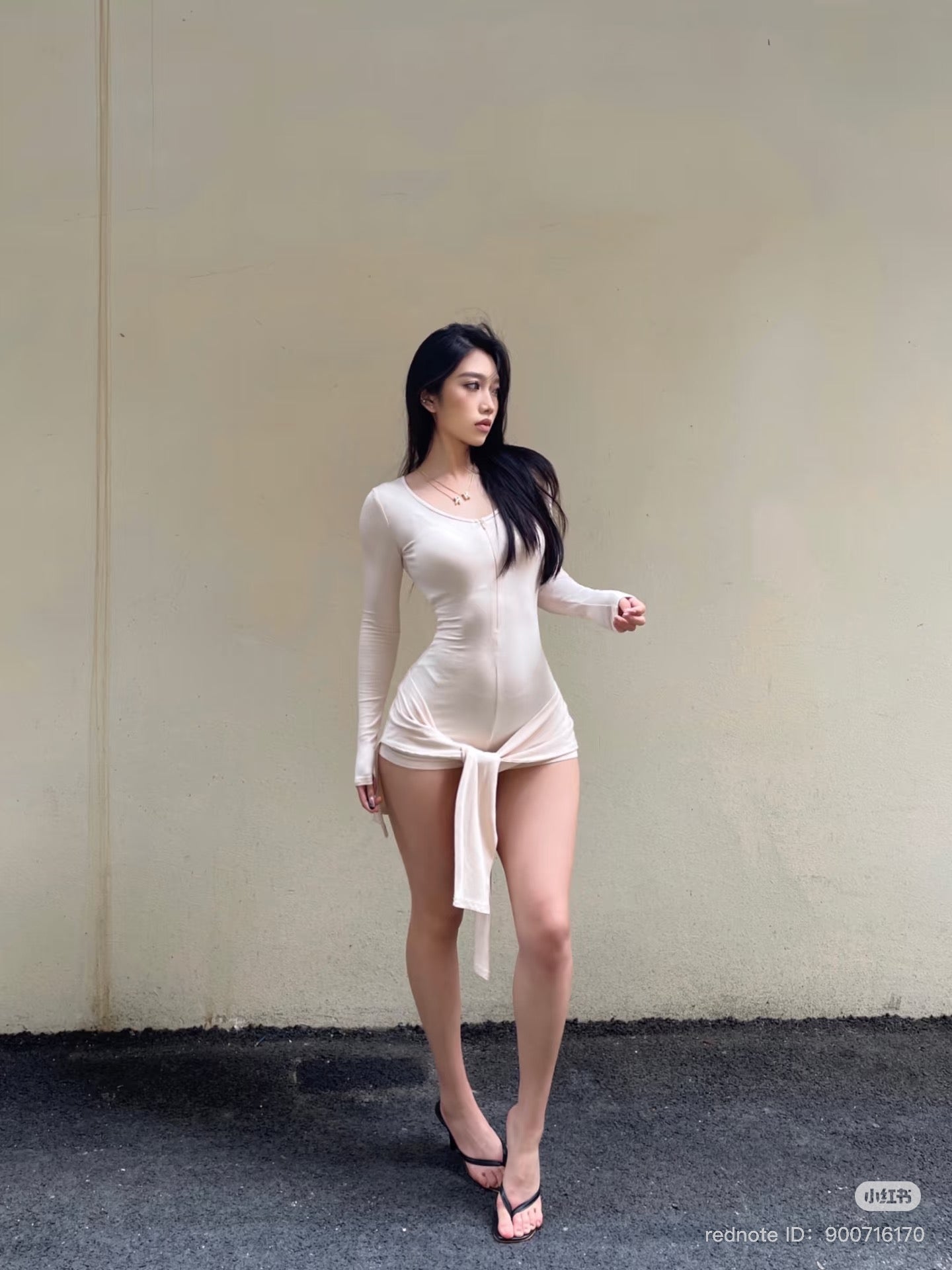 a- White two piece long sleeved bodysuit